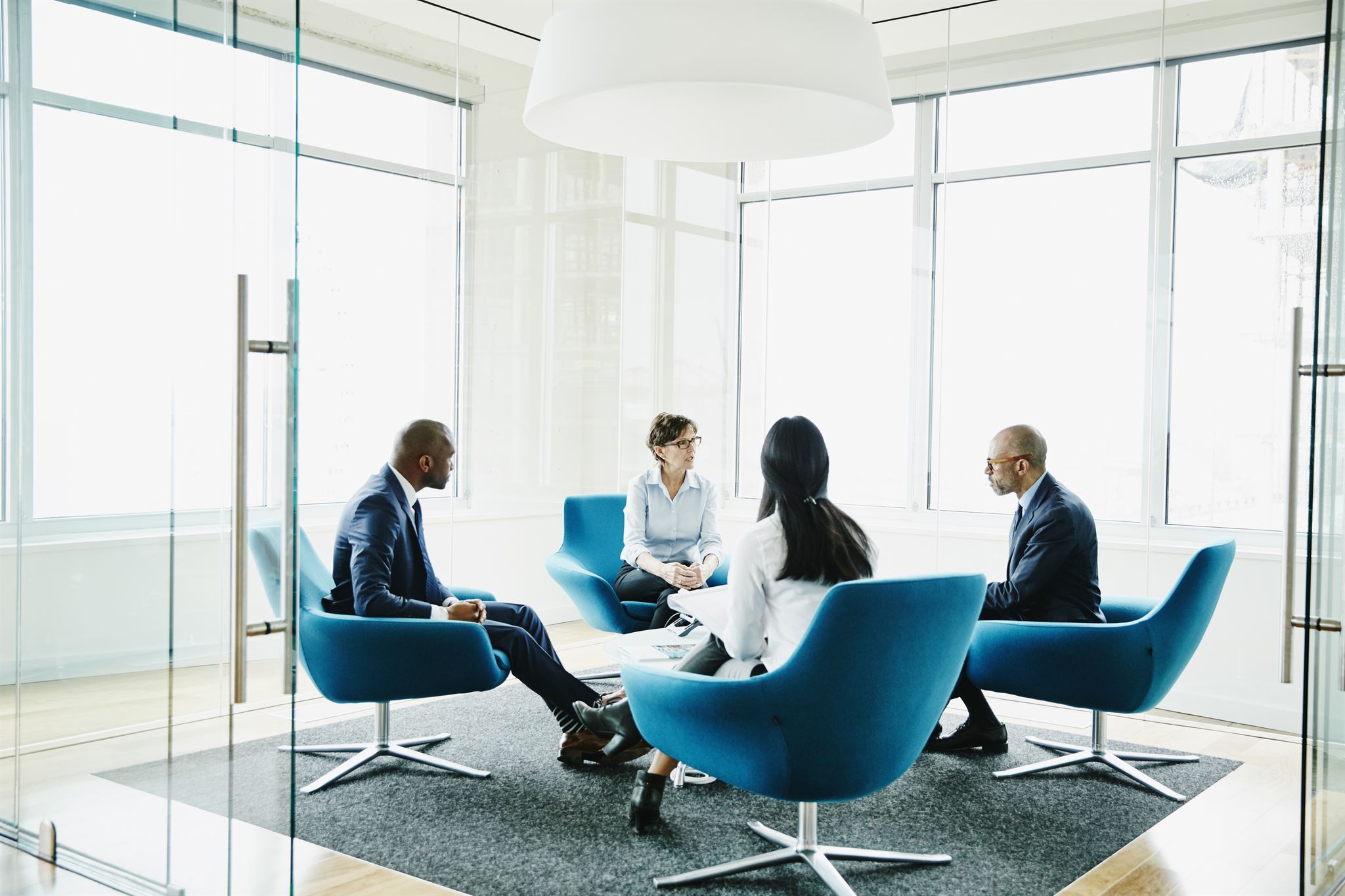 People-sitting-on-blue-chairs